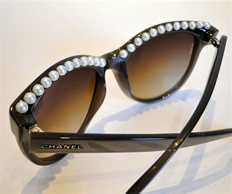 new chanel sunglasses with pearls|Chanel sunglasses pearl on side.